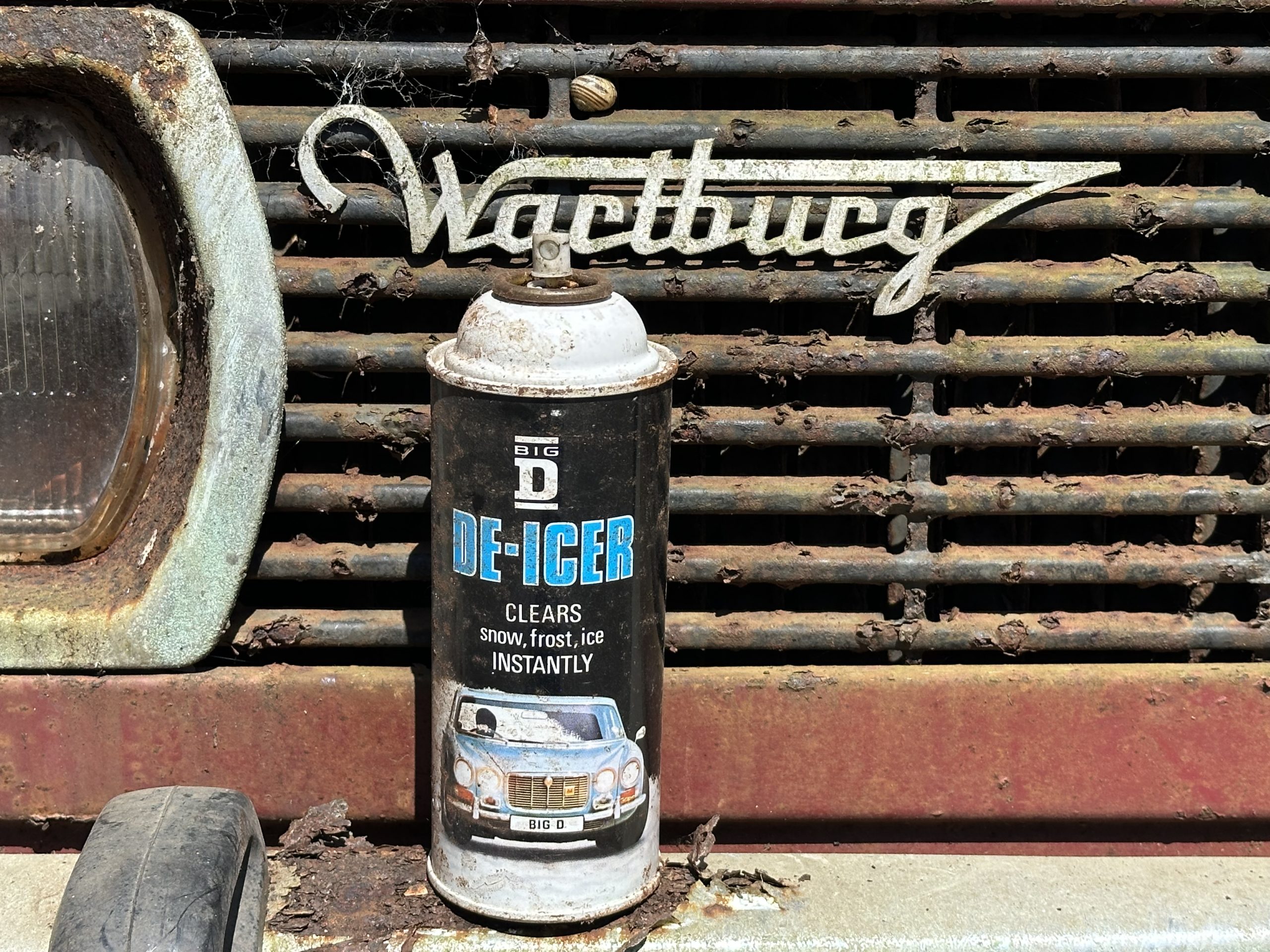 Big D de-icer spray can close-up showing retro packaging and branding