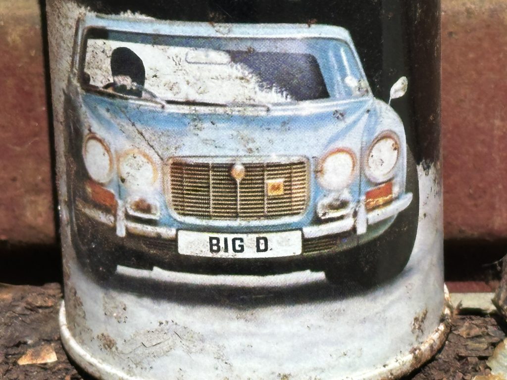 Vintage Big D de-icer can with classic Jaguar illustration on label close-up
