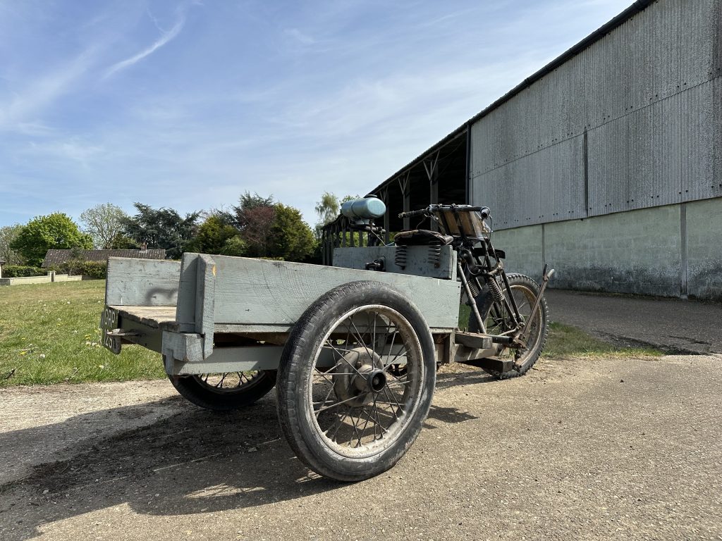 rear side view wooden bed three wheel utility trike