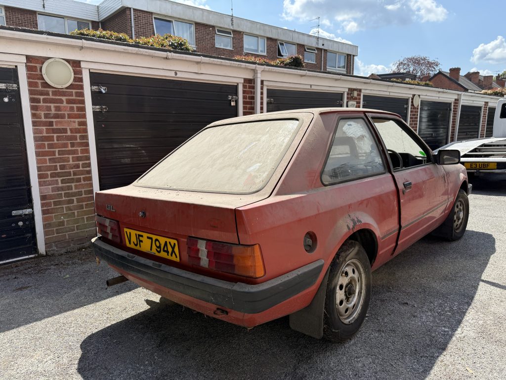 Rear three-quarter view of 1982 Ford Escort survivor