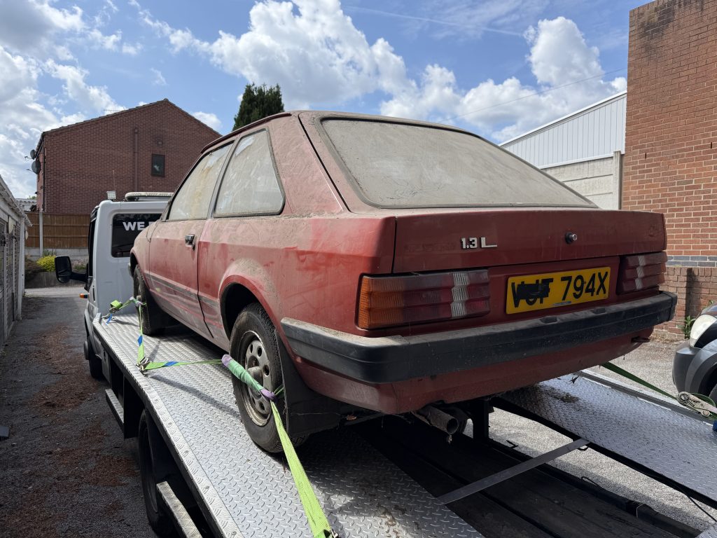 Rear view of 1982 Ford Escort 1.3L on transporter
