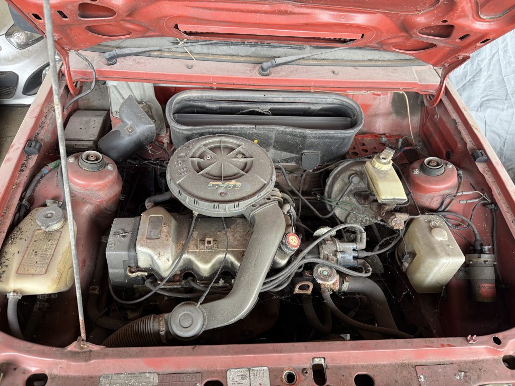 Original engine bay of 1982 Ford Escort 1.3L